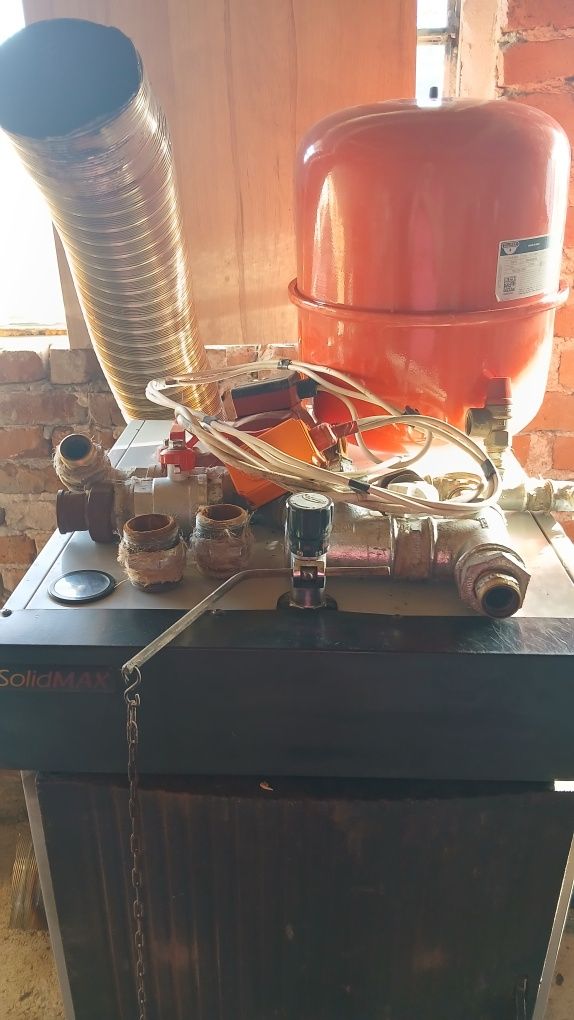 Чугунен котел на твърдо гориво SolidMAX