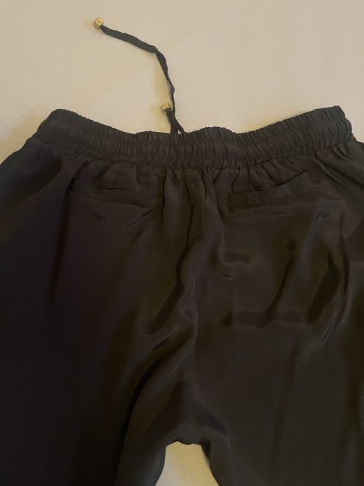 Pantaloni dama negri luciosi