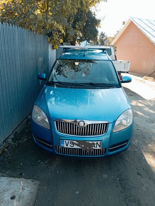 skoda roomster 1.2 benzina an 2009