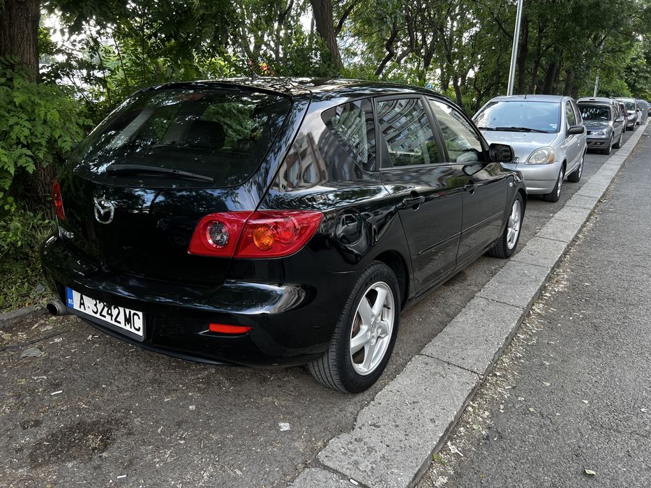 Mazda 3 1.6d 109кс