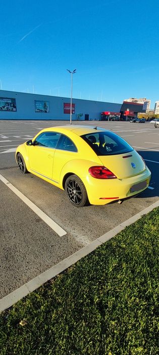 VW BEETLE 1.2 BENZINA 105 CP
2 geamuri electrice
dublu climatronic
sen