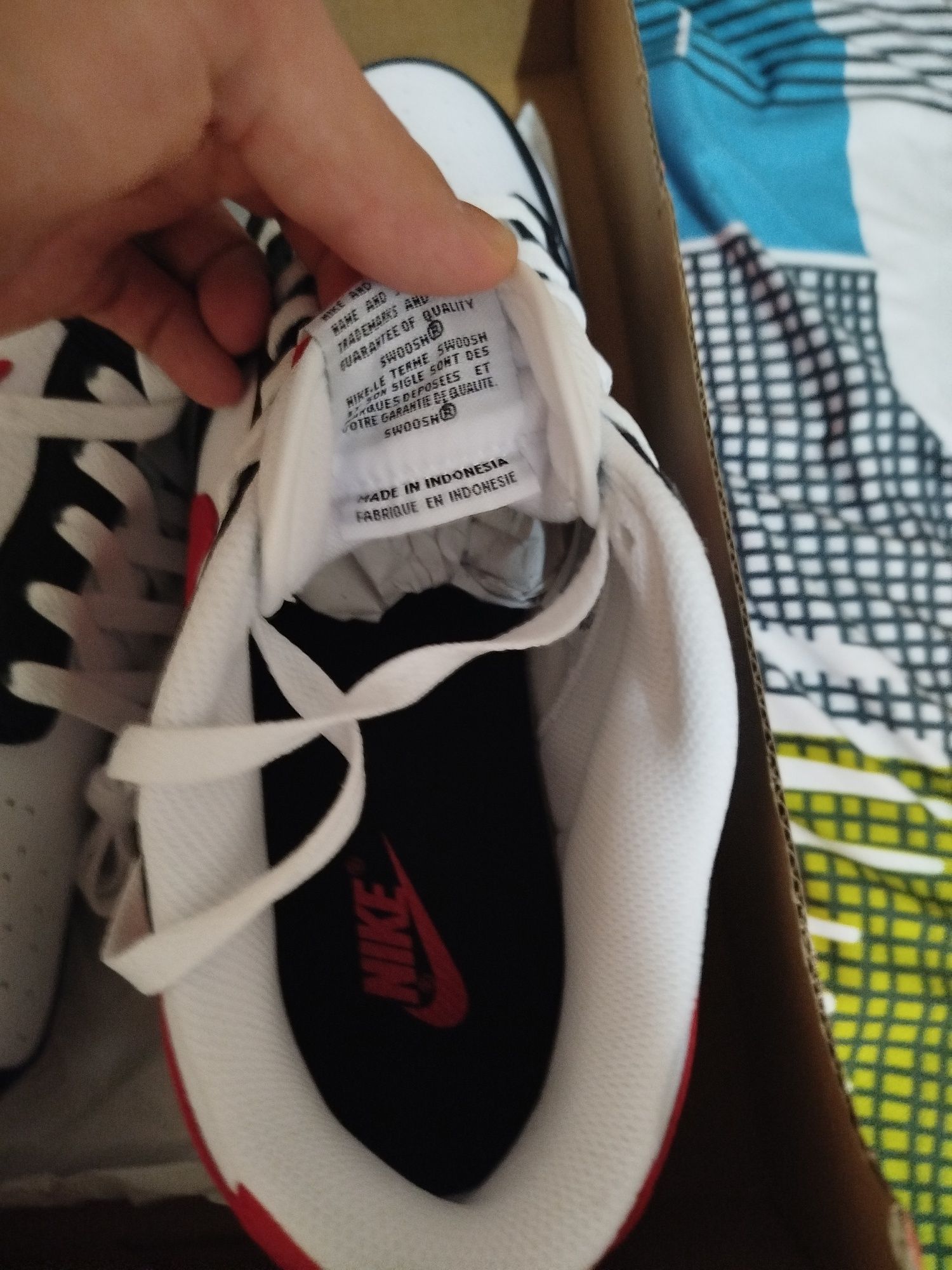 Nike dunk low retro red swoosh panda