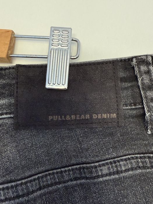 Blugi negri cu ruptura