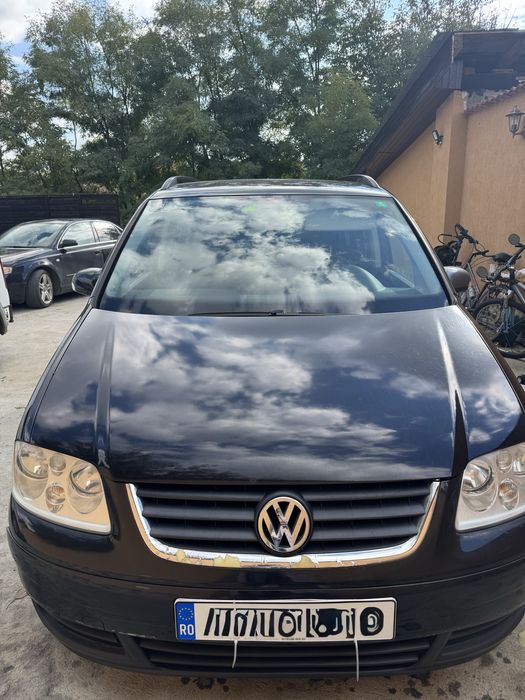 VW TOURAN ,fara rugina,usor negociabil,recent inmatriculata