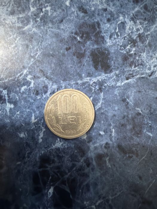 Vand monede vechi de 100 de lei