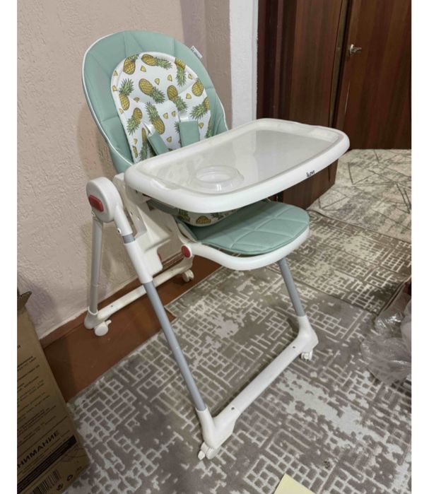 Продам стульчик для кормления Ilovi