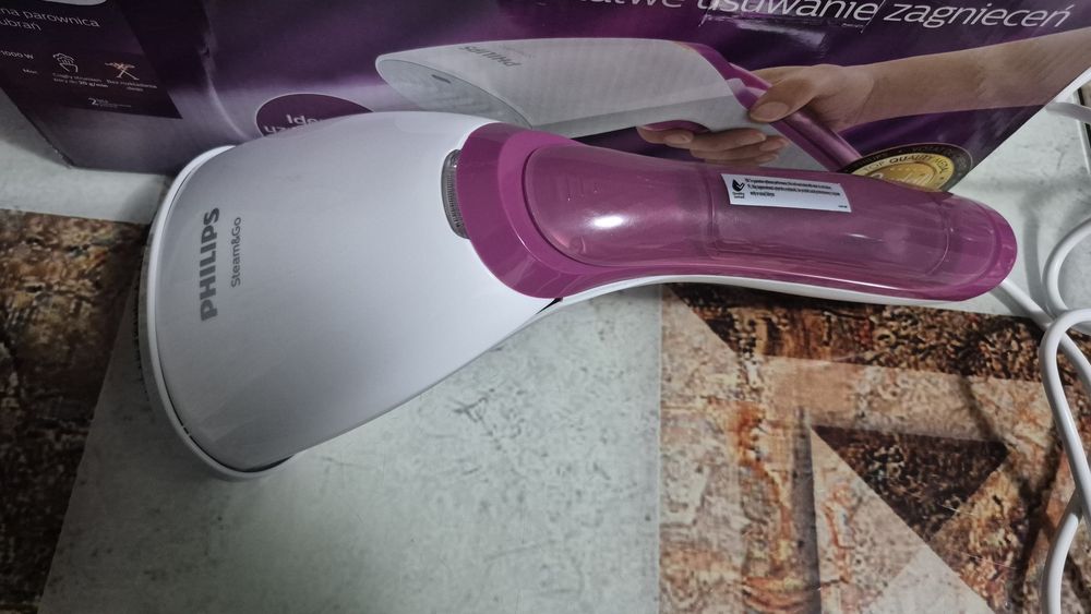 Aparat de calcat vertical cu aburi