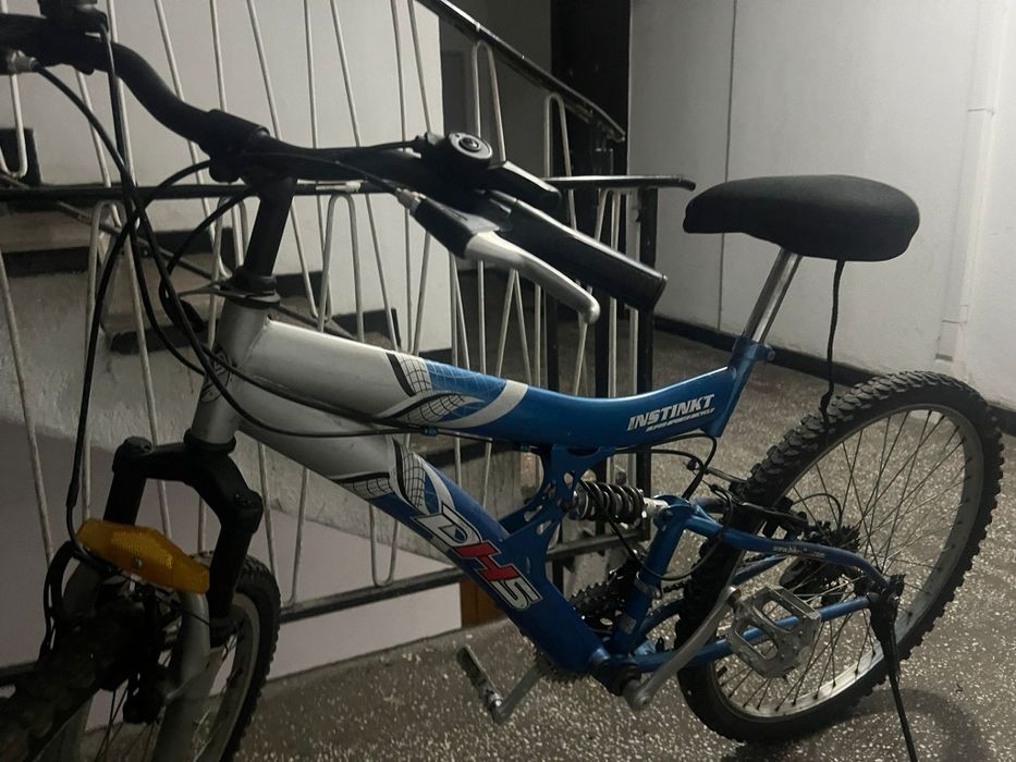 Vând bicicleta  dhs cu suspensie cadru și roata față