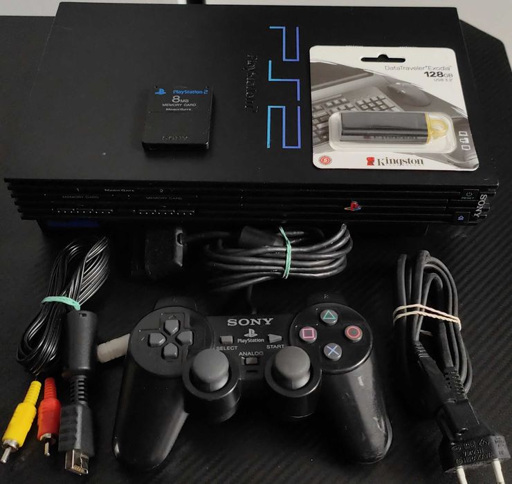 Playstation 2 cu 33 jocuri de top ,maneta ,cabluri