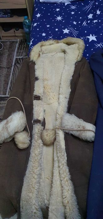Haine de blană second hand