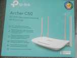 Продам новый    двухдиапазонный  Wi -Fi  роутер  Archer C 50