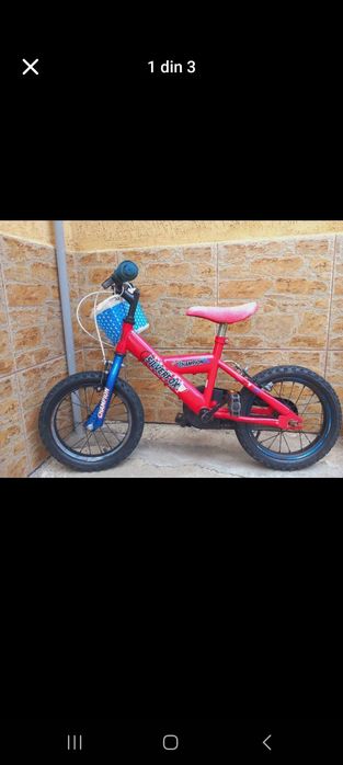 Bicicletă cu roti ajutătoare