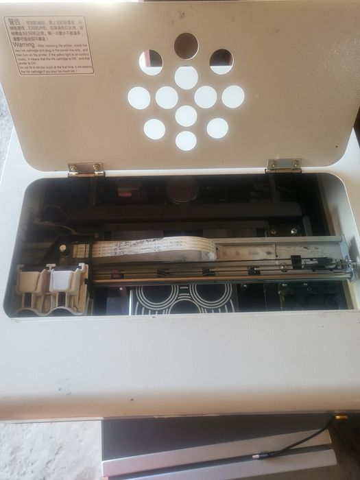 Принтер за рисуване върху кафе и млечни продукти