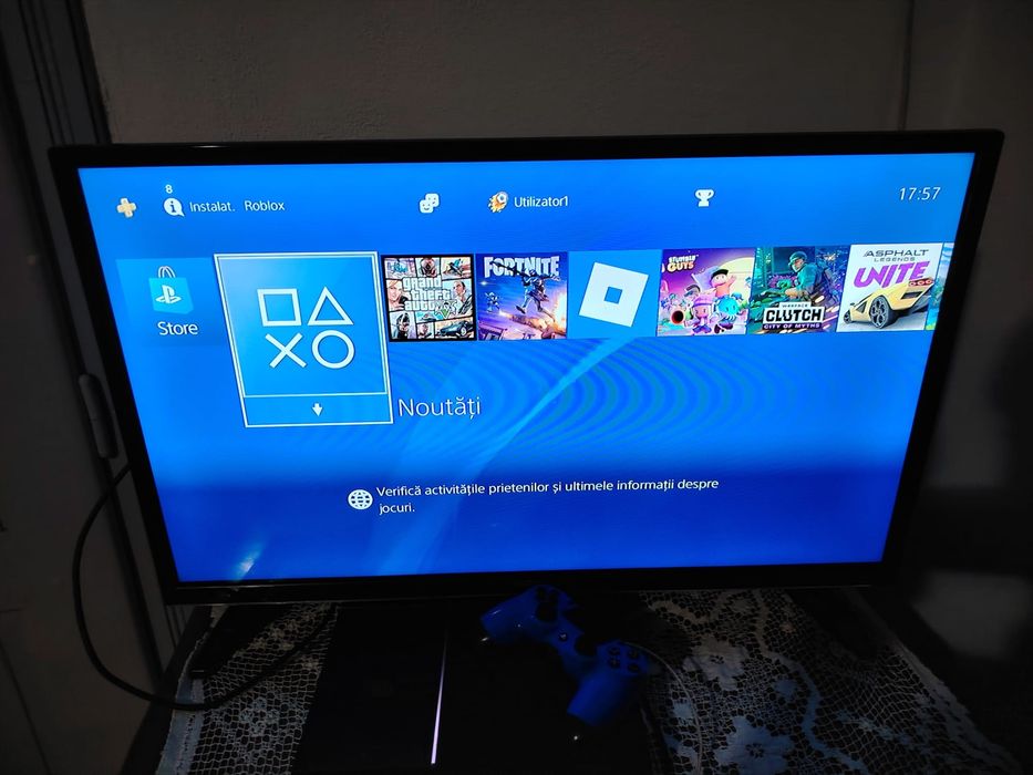 Vând PS4 +5 jocuri,cu volan și pedale