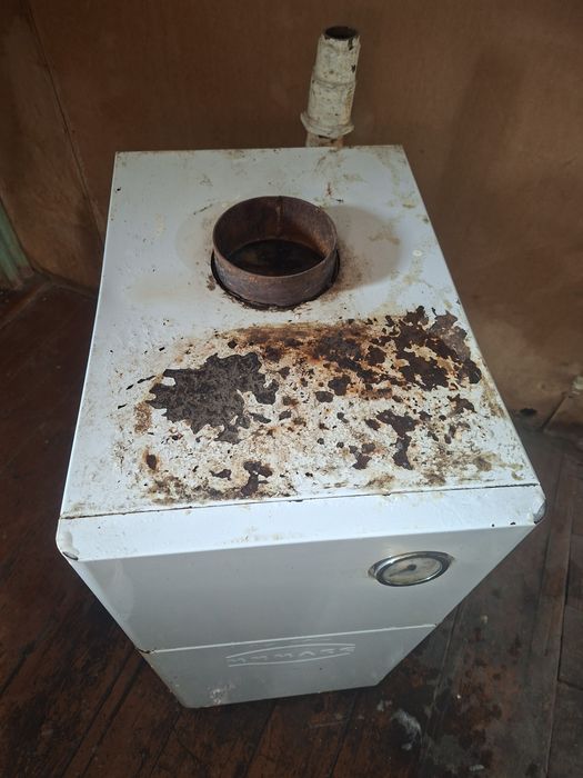 Продам газовый котел б/у   50 тысяч тенге .Торг уместен