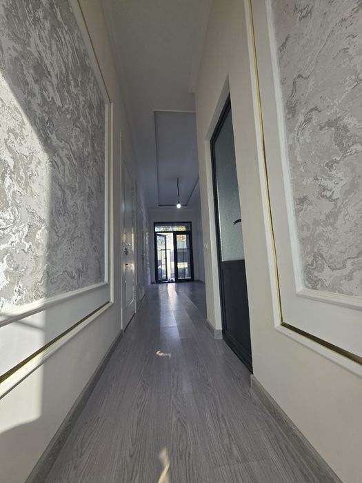 Кибрай Бурота махалла янги уй 3 хона 2,3 сотих .