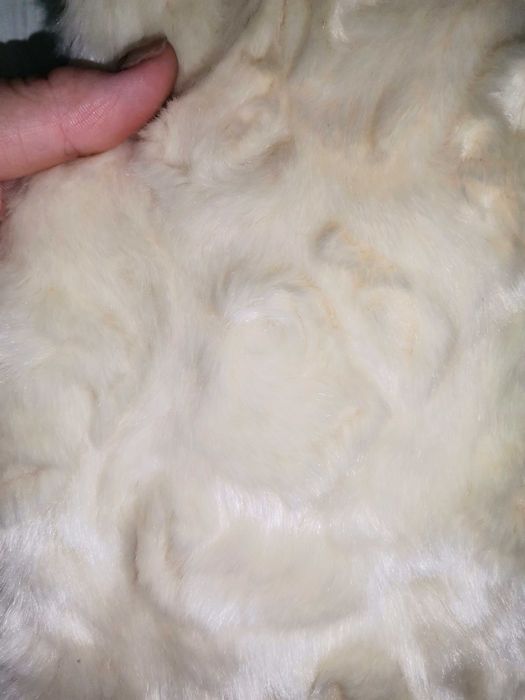 Vesta de blana, puf
