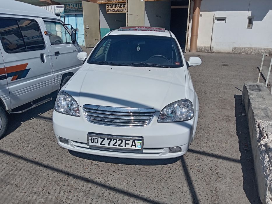 Ласетти 1.6 автомат.