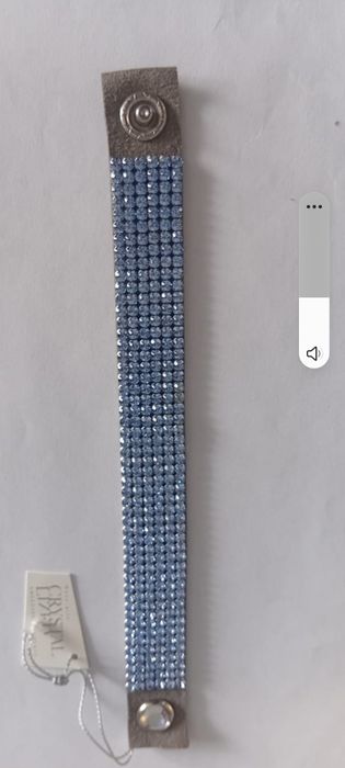 Продам браслет украшенный кристаллами Сваровсого