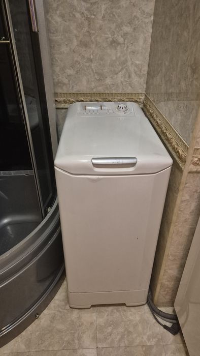 Стиралка вертикальная