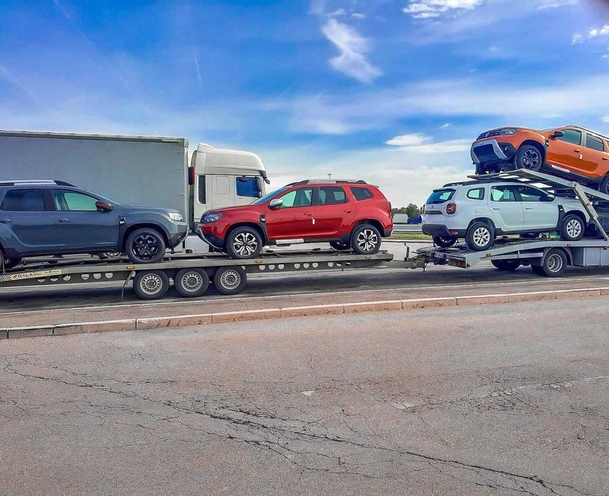 Transport auto pe platforma