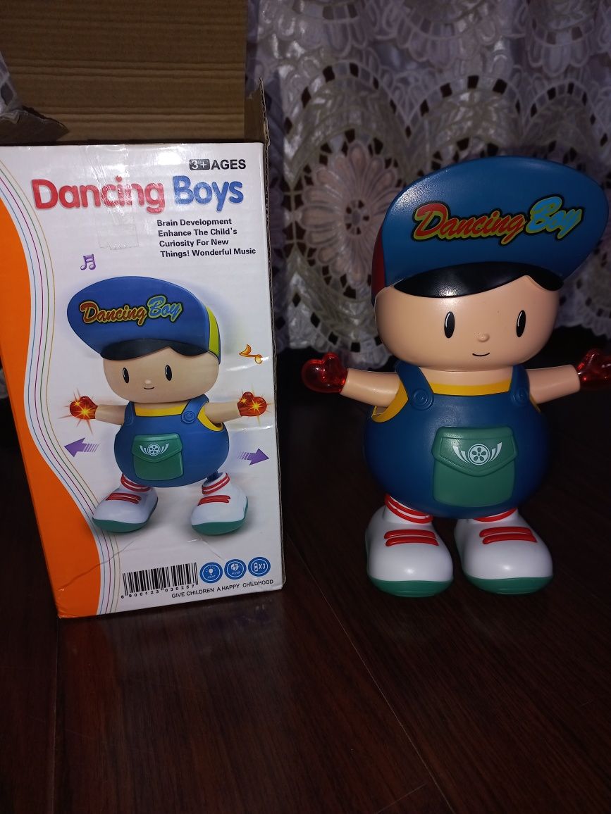Продам игрушку музыкальная танцующий