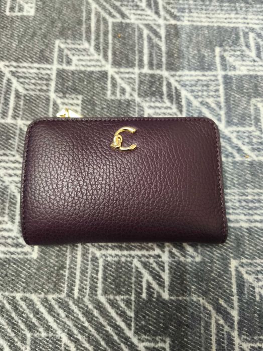 Кожено портмоне Coccinelle, лилаво