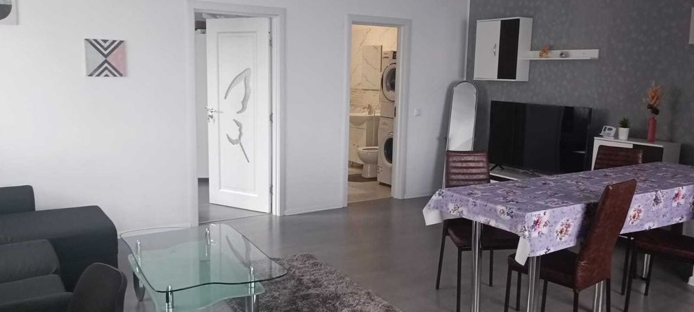 Inchiriez ap 2 camere mobilat/utilat complet,curte proprie-Sanpetru