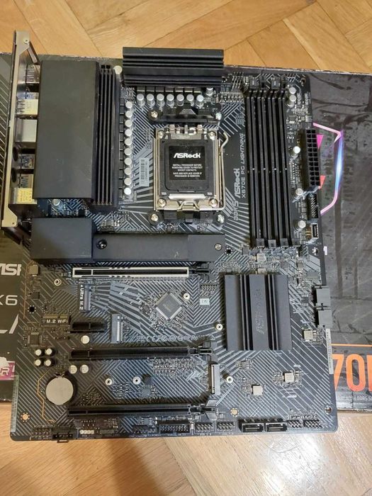 AMD Ryzen 9 7900X + AsRock X670E PG Lightning