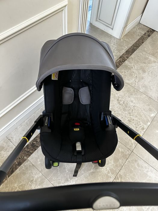 Коляска Doona + база isofix doona