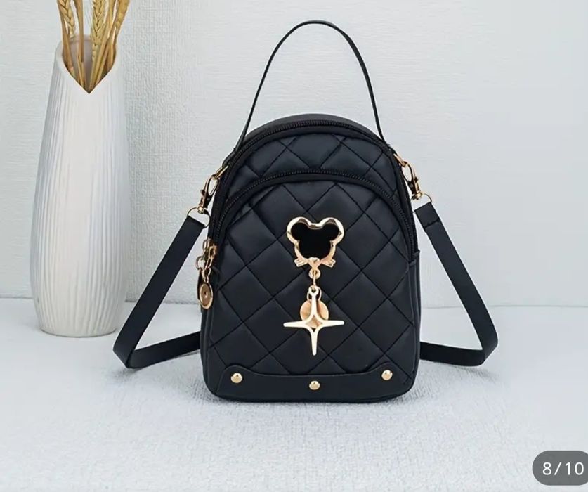 Рюкзак екі иықты.