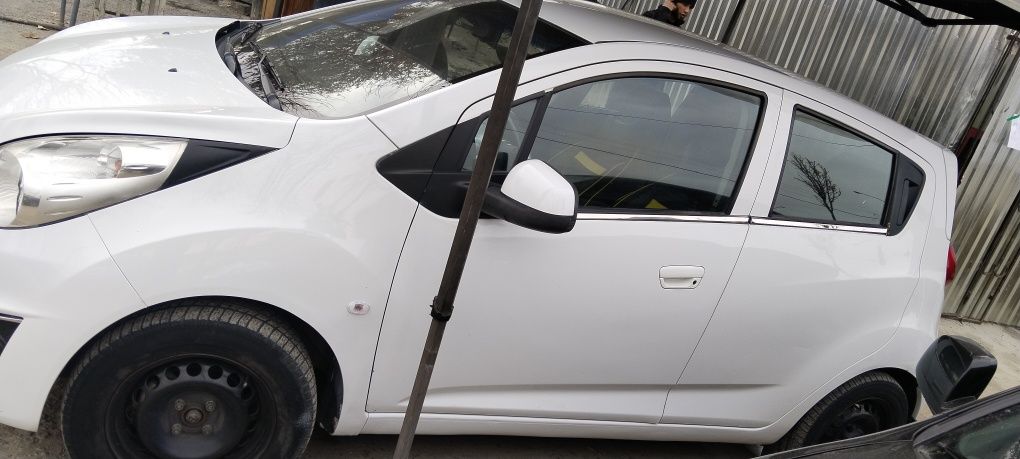 Spark 2010 probeg 258.000 .gaz,benzin