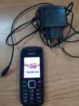 Telefon Nokia 1661-2 necodat lanterna ca nou functional cu incarcator