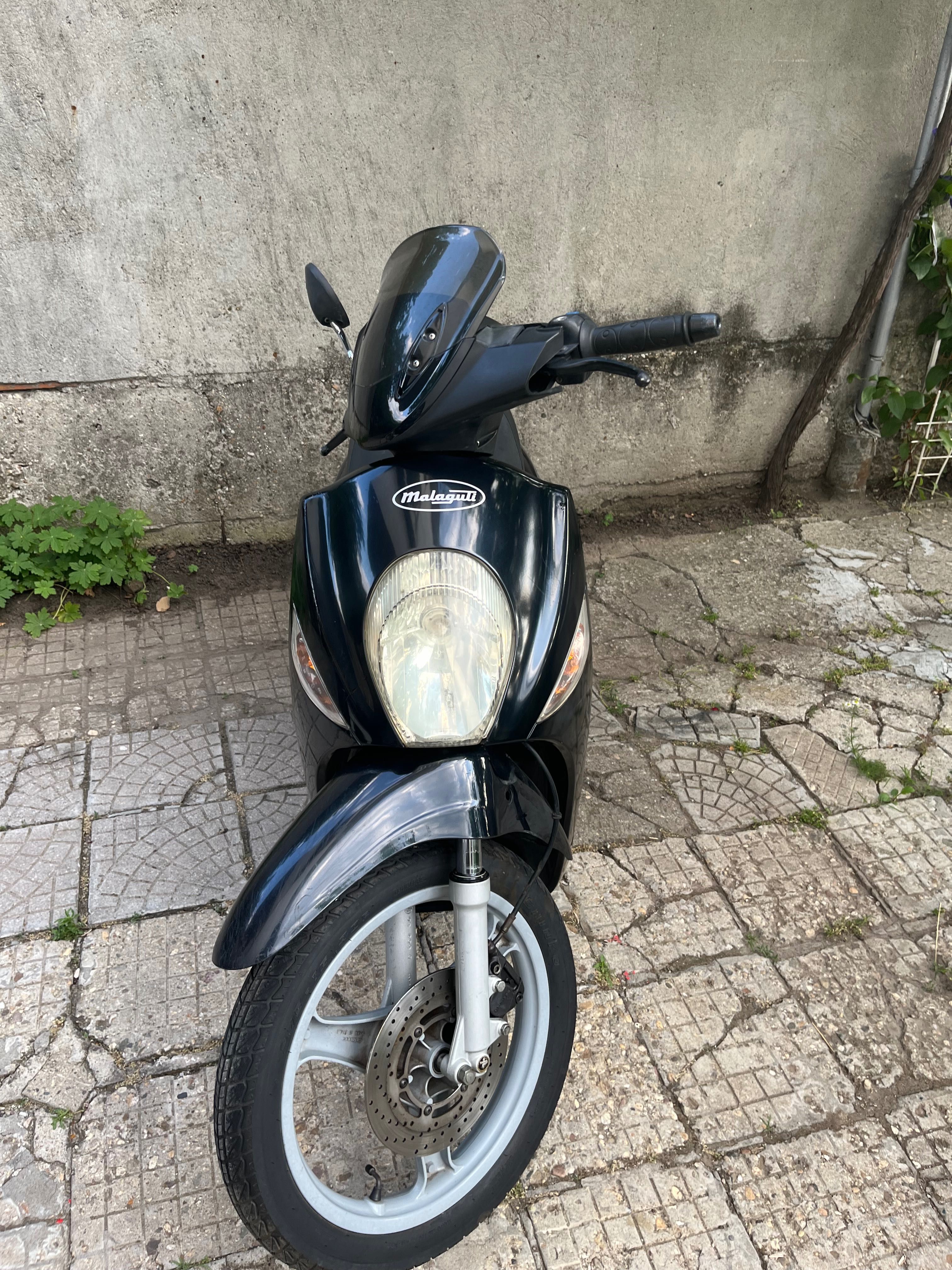 Скутер 125 кубика