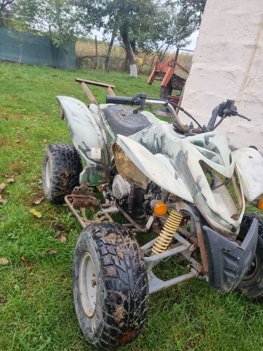 Vând atv defect motor 125