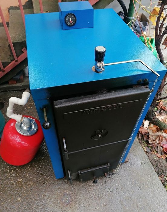 Vând centrala termica pe lemne și cărbuni de 24kw