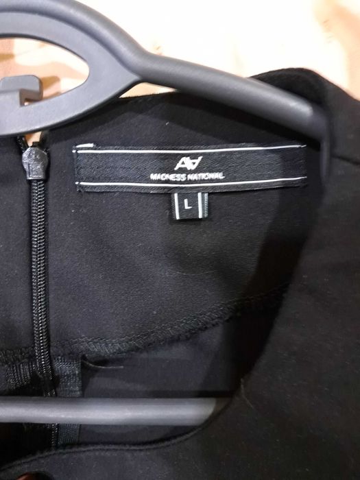 Черна елегантна рокля на марката Amnesia