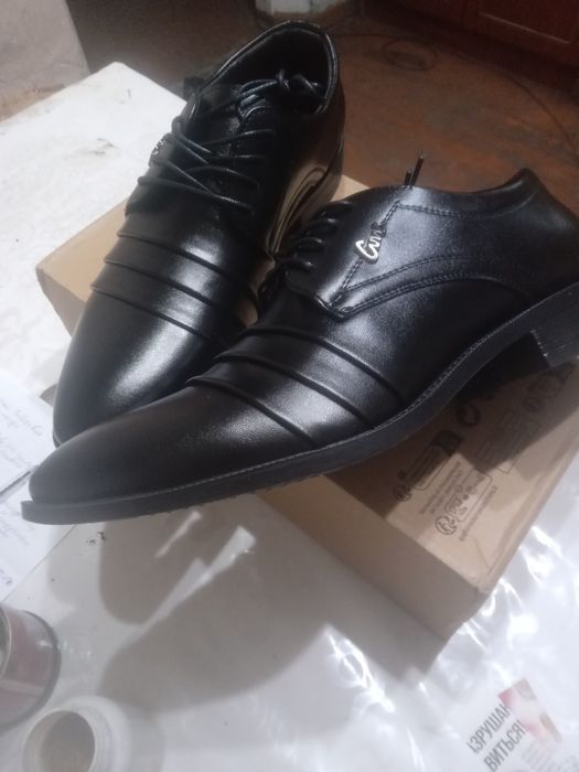 Новые  мужские туфли