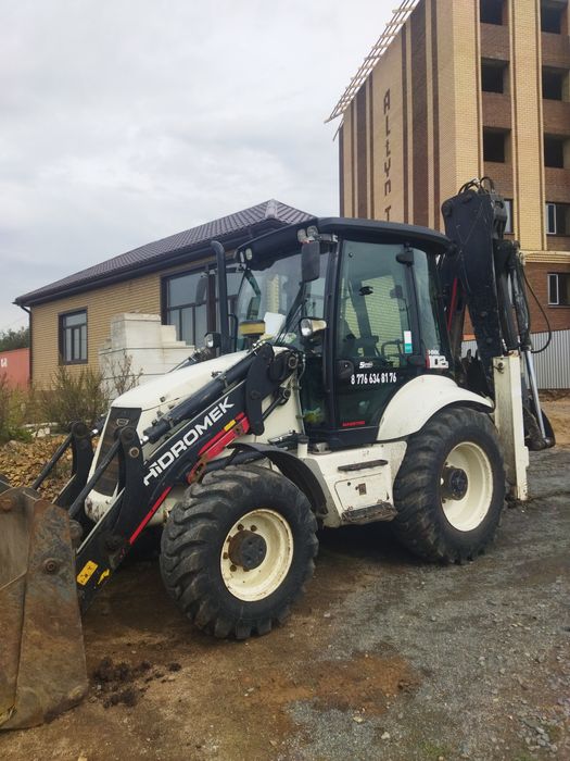 Услуга экскаватор-погрузчик