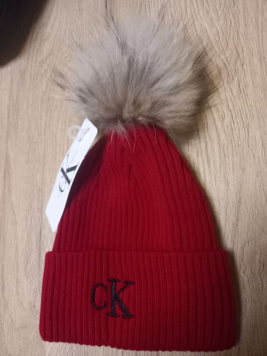 Căciulă  moț blana