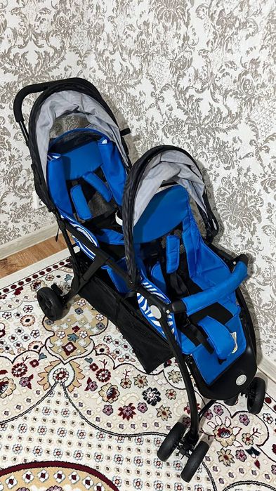 Коляска егіздерге сатылады