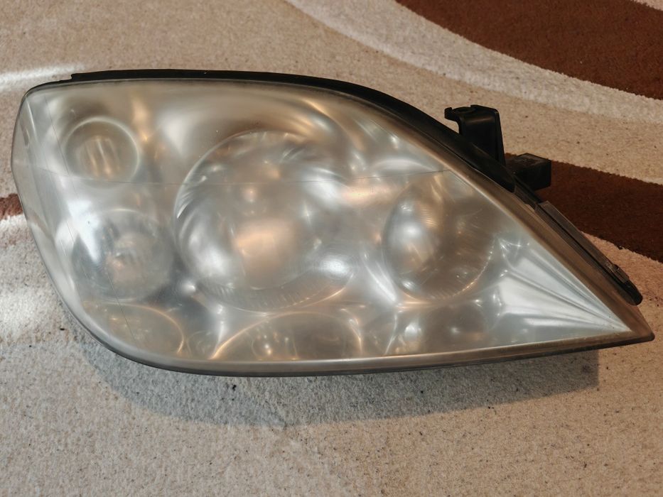 Фар за Нисан Примера (p12)