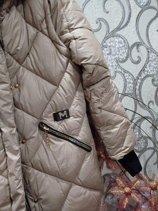 Женский пуховик.