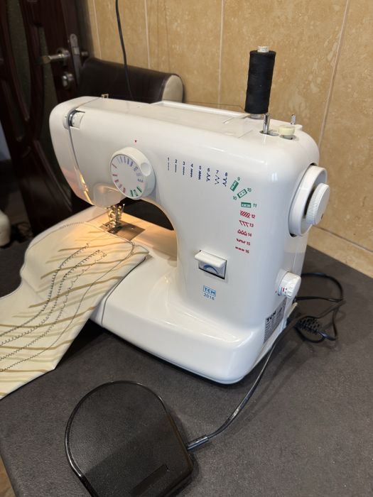 Masina de cusut festonat si butoniere TCM