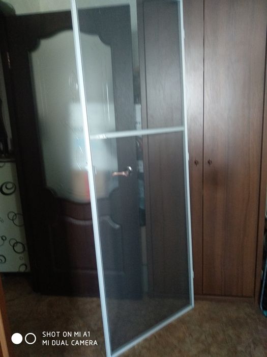 Продам москитную сетку  новую для балконной двери