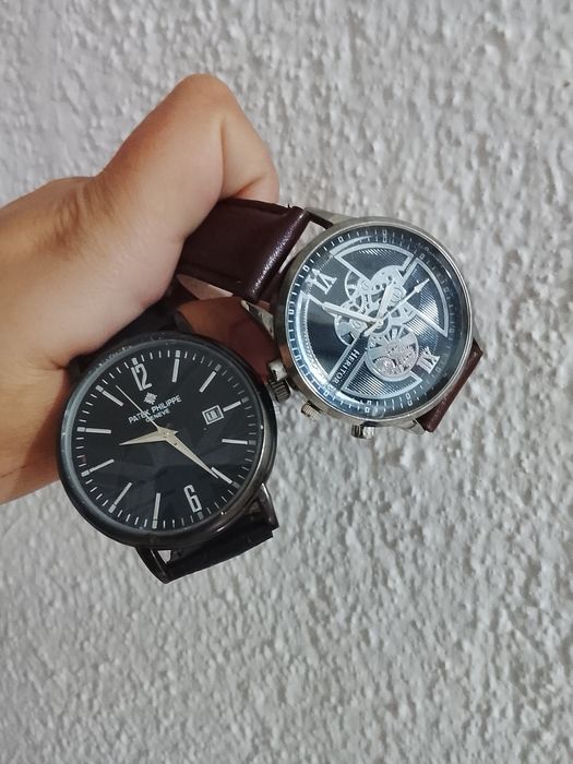 Мужские часы .1черный 2коричневый.