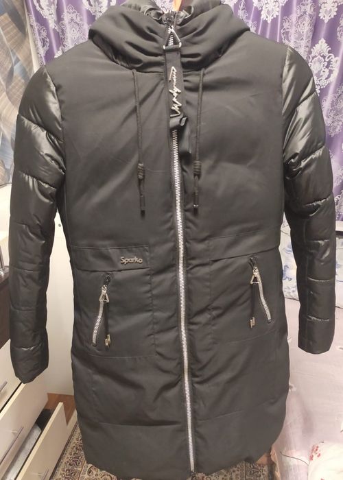 Продам зимнию  куртку новый