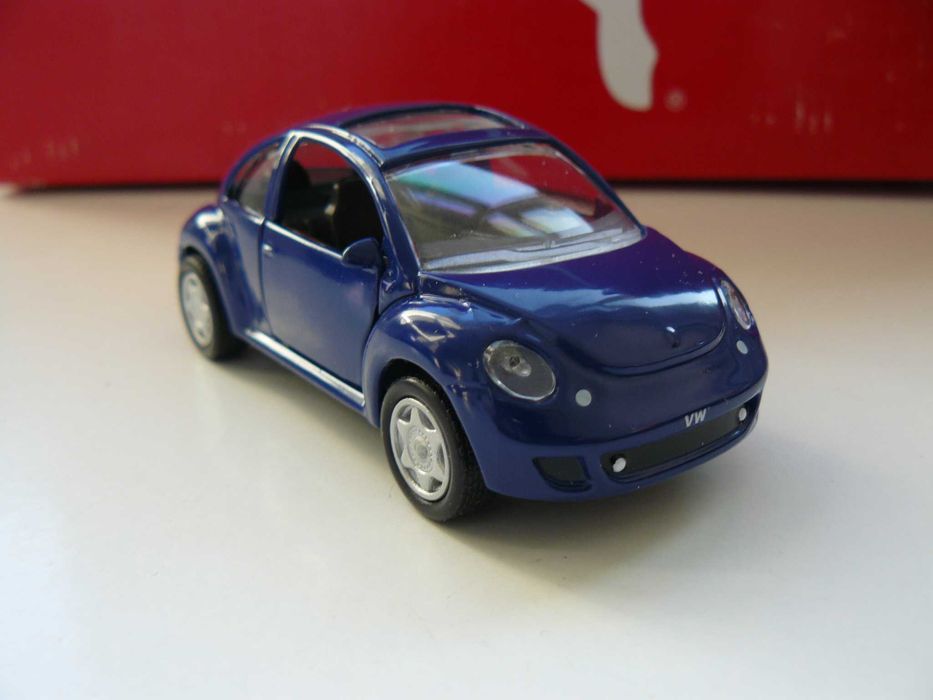 Macheta Auto De Colectie VOLKSWAGEN NEW BEETLE Scara 1:43,Noua AmerCom