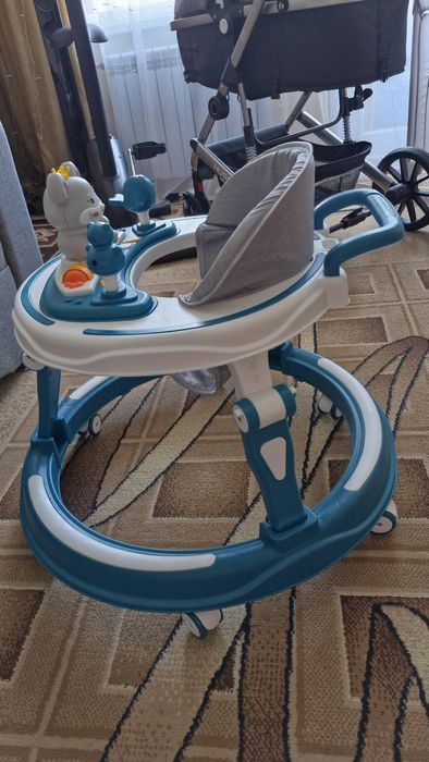 Ходунки (новые),  музыкальные с регулируемой высотой.