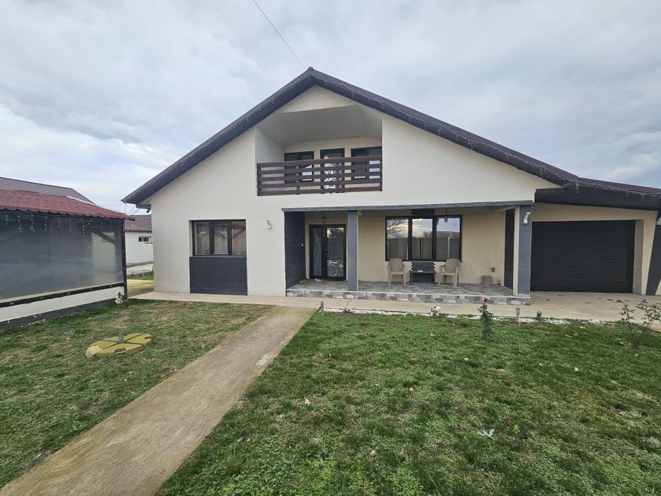 Casa de vanzare la gata